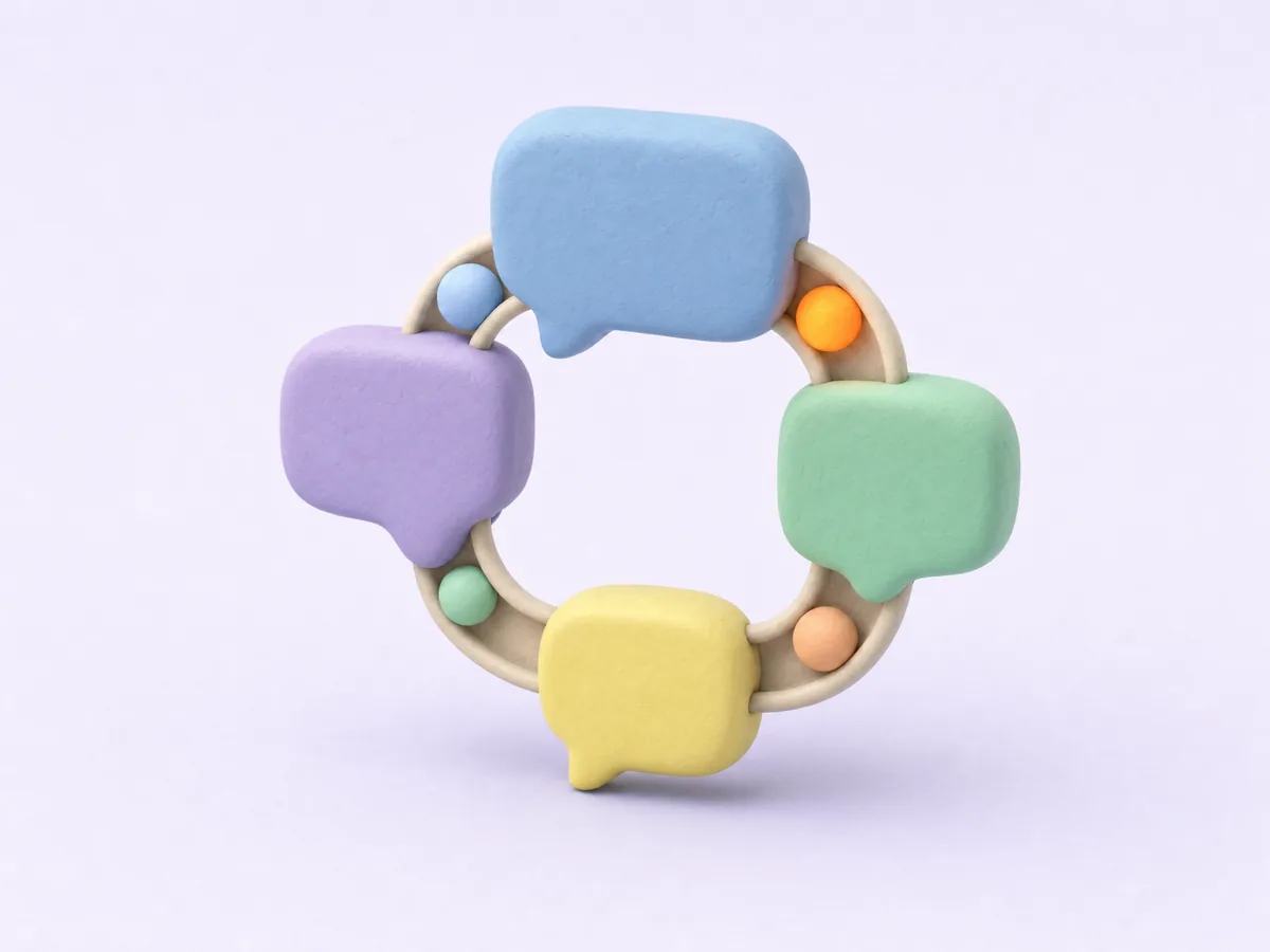 Four pastel clay speech bubbles joined in a loop by a cream tube, with small spheres travelling between them.